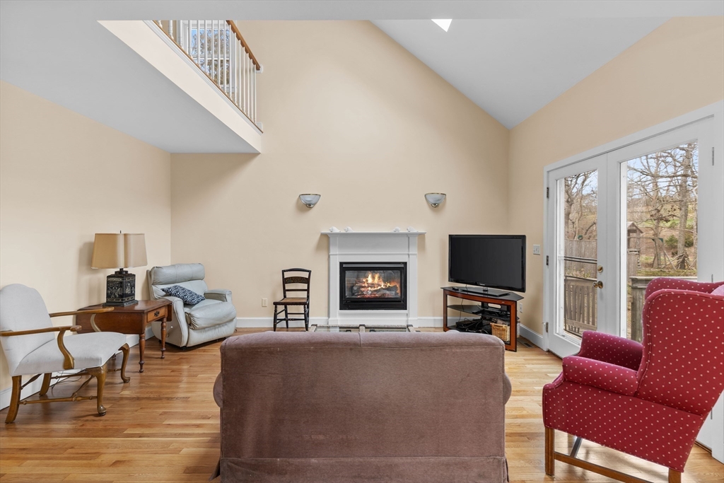 376 Pleasant Bay Road Harwich, MA 02645 - Photo 4 of 17 a living room with furniture and a flat screen tv