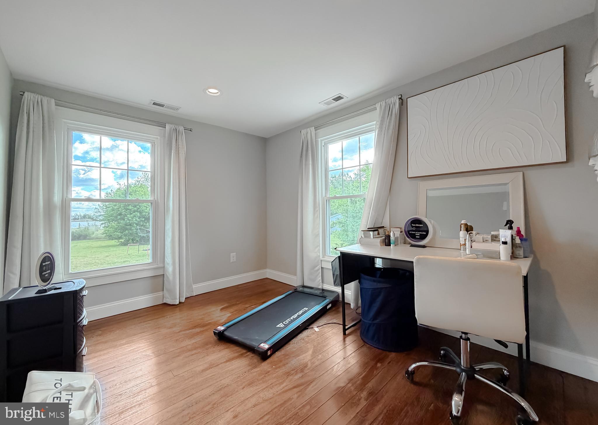 16146 Thomas Road Piney Point, MD 20674 - Photo 23 of 57 a living room with furniture and a window