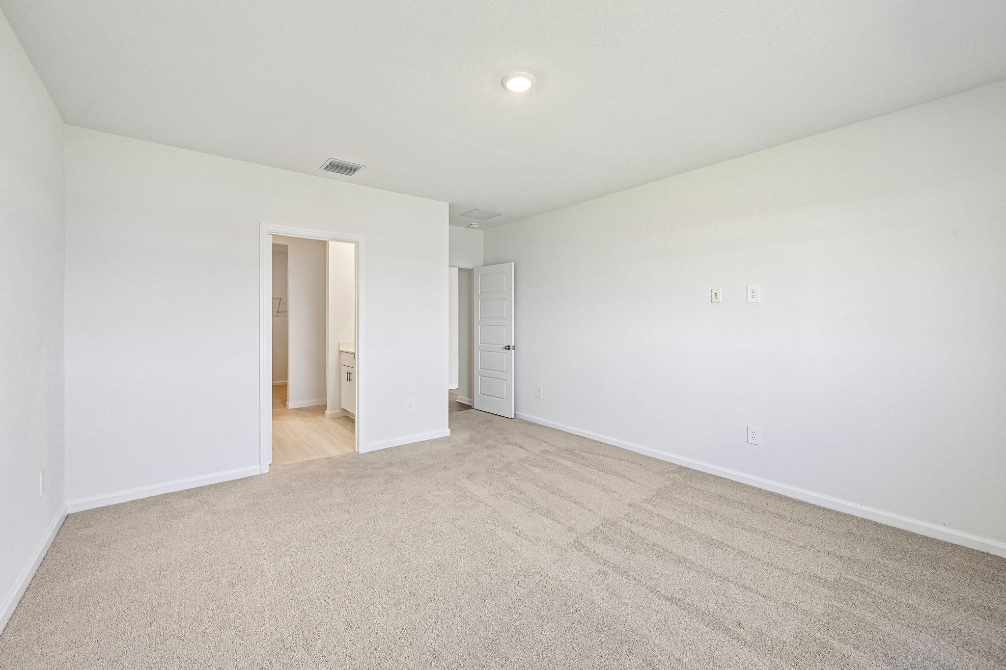 14503 Southwest New Dawn Road Indiantown, FL 34956 - Photo 28 of 42 an empty room with an entryway