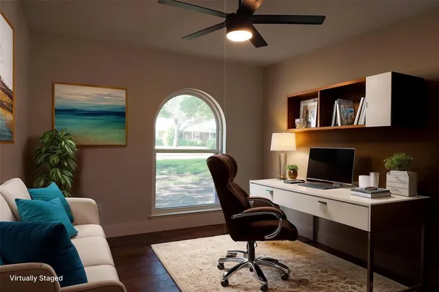 a workspace with furniture and a window