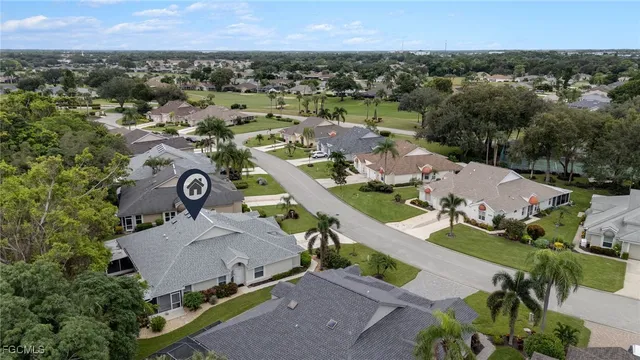 an aerial view of a house with outdoor space