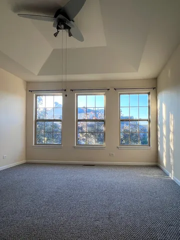 a view of a bathroom with a sink and mirror