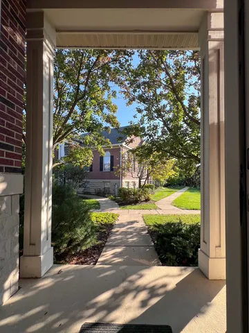 a view of a back yard from a room