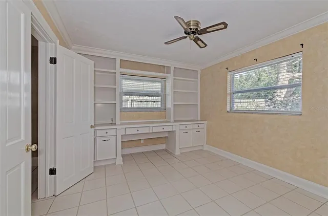 a living room with furniture and window