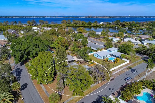 an aerial view of a house with a garden