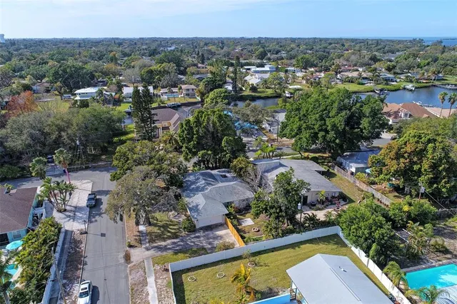 an aerial view of a house with a garden