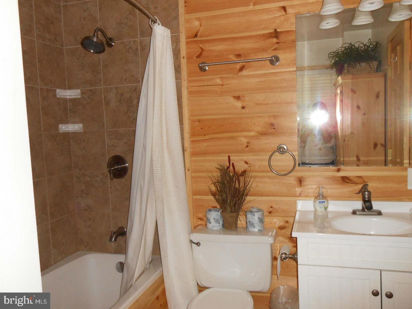 1280 Mountainside Road Berkeley Springs, WV 25411 - Photo 18 of 21 Nice full bath with ceramic tile walls