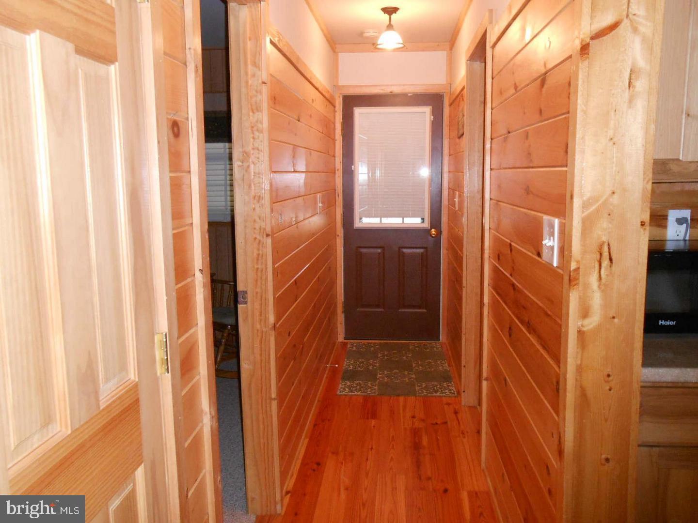 1280 Mountainside Road Berkeley Springs, WV 25411 - Photo 10 of 21 Wood walls, wood floors, wood ceilings!