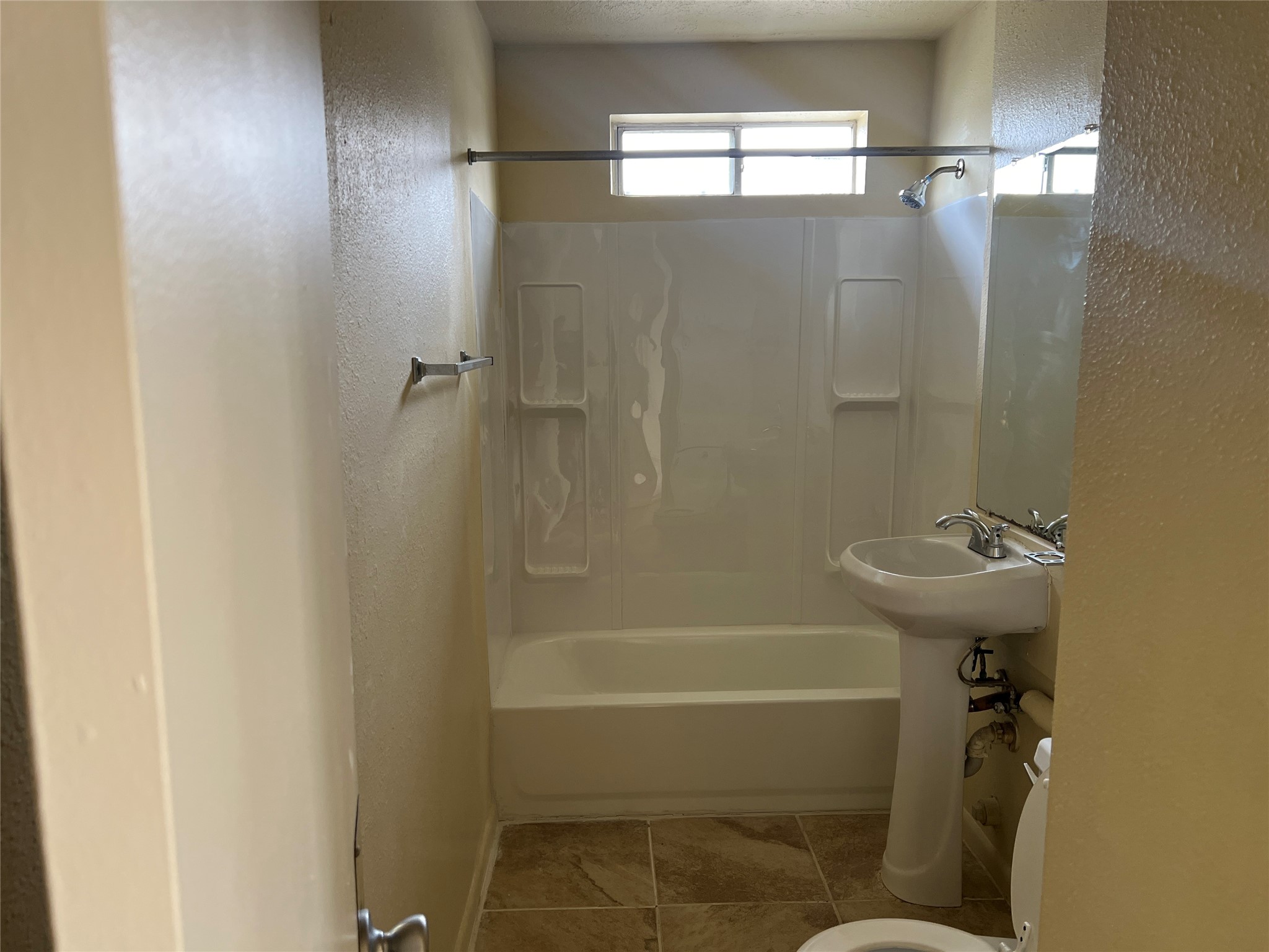1201 Gillette Street, Unit 4 Houston, TX 77019 - Photo 12 of 12 a bathroom with a shower and a toilet