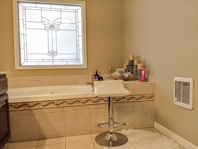a bathroom with a sink and a shower