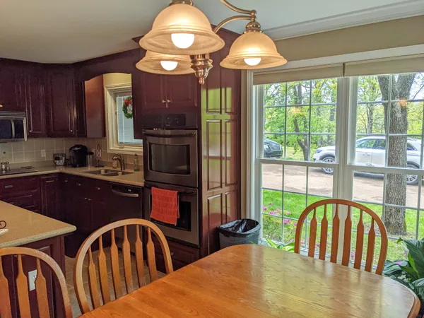 a view of a dining room with furniture