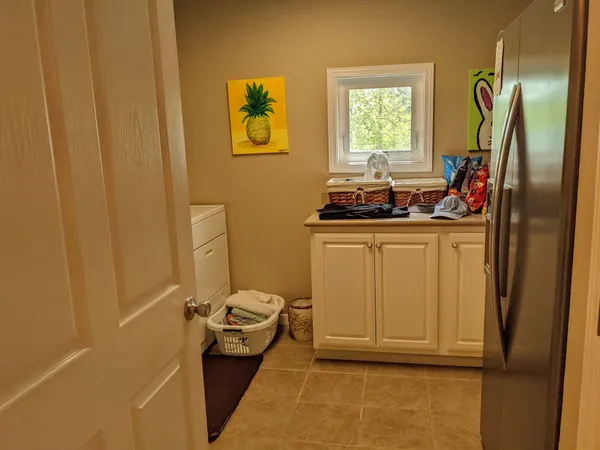 a view of a bathroom with a sink and a vanity