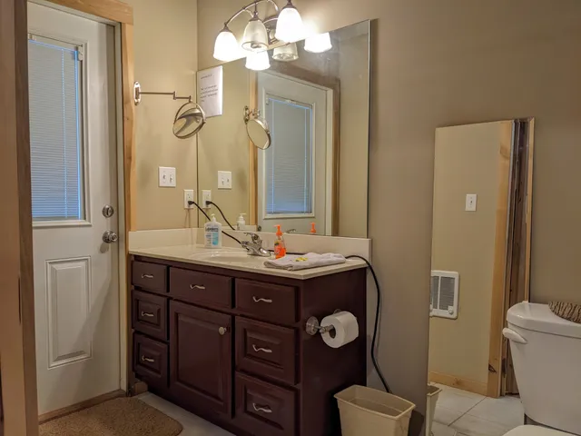 a view of fireplace with wooden floor