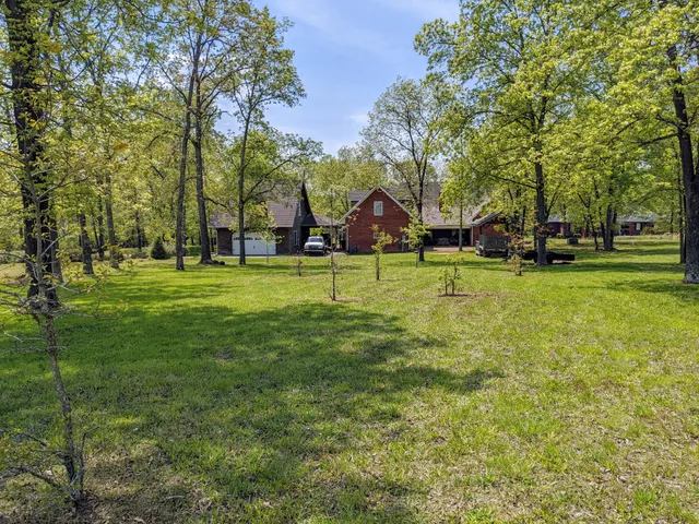 a side view of a house with garden