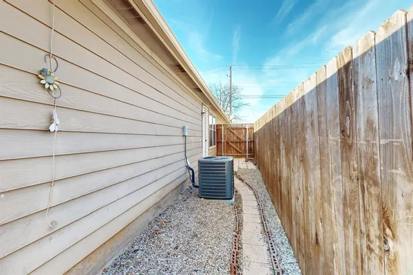 a view of a back yard of the house