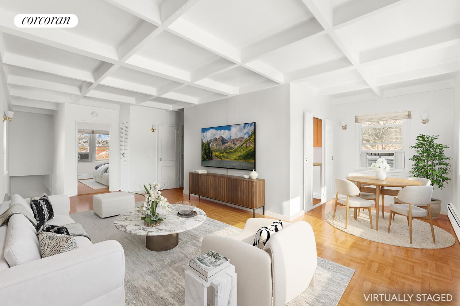 147-36 Charter Road, Unit 34E Queens, NY 11435 - Photo 4 of 14 a living room with furniture and a flat screen tv