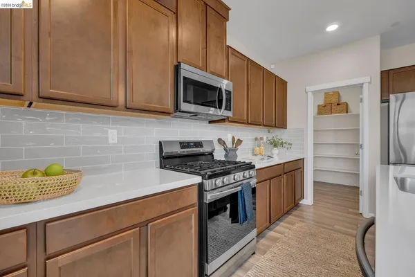 a terrace with outdoor seating and city view