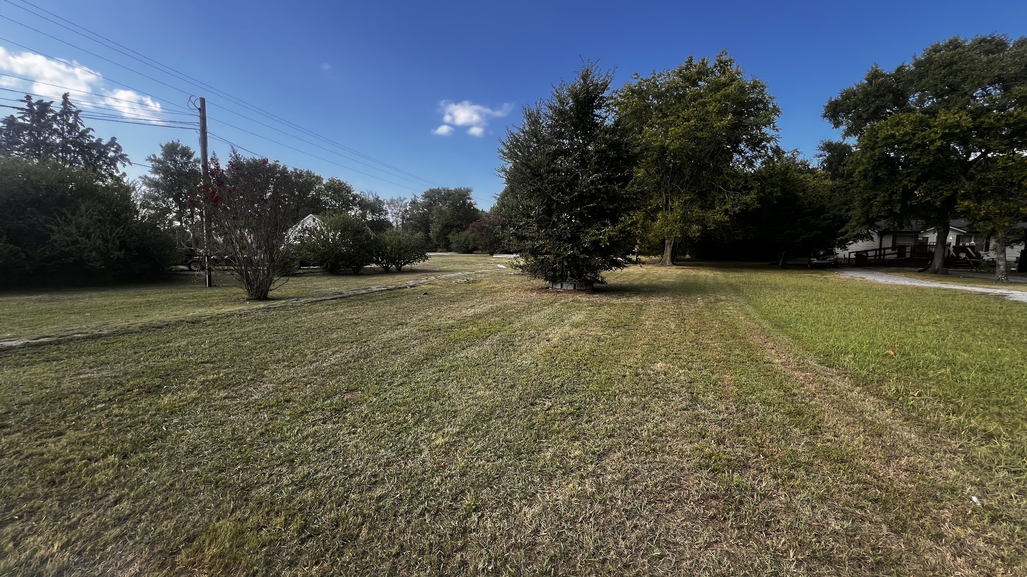 1063 Bluebird Road Lebanon, TN 37087 - Photo 6 of 8 a backyard of a house with lots of green space