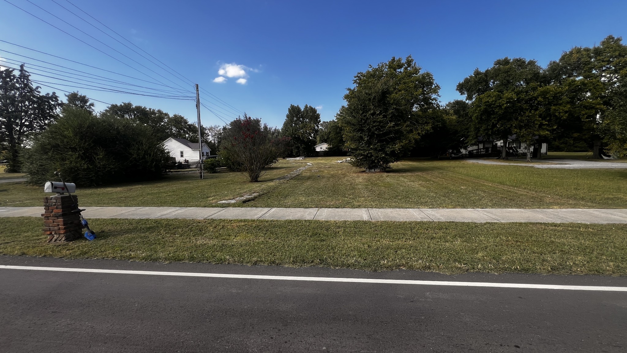1063 Bluebird Road Lebanon, TN 37087 - Photo 7 of 8 a backyard of a house with lots of green space
