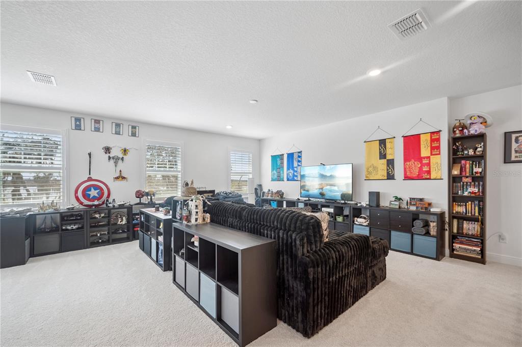 17588 Lake Star Road Winter Garden, FL 34787 - Photo 33 of 57 a view of a livingroom with furniture and window