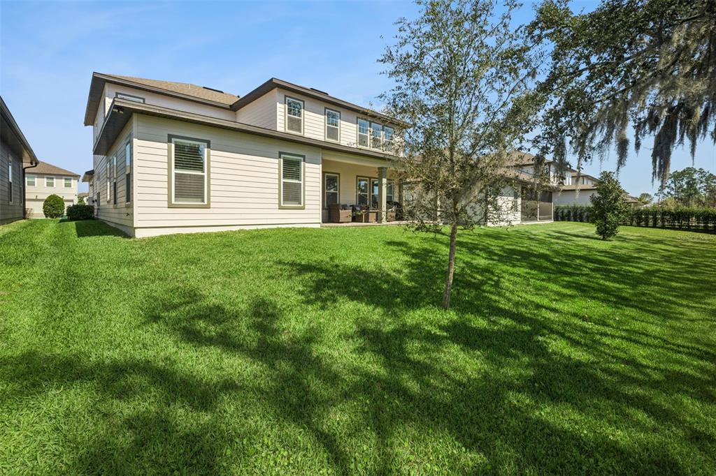 17588 Lake Star Road Winter Garden, FL 34787 - Photo 42 of 57 a front view of a house with a yard