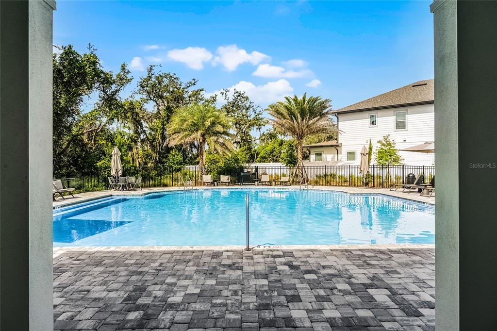 17588 Lake Star Road Winter Garden, FL 34787 - Photo 46 of 57 a view of a swimming pool with a patio