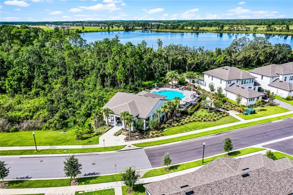 17588 Lake Star Road Winter Garden, FL 34787 - Photo 51 of 57 an aerial view of a house with a garden and lake view