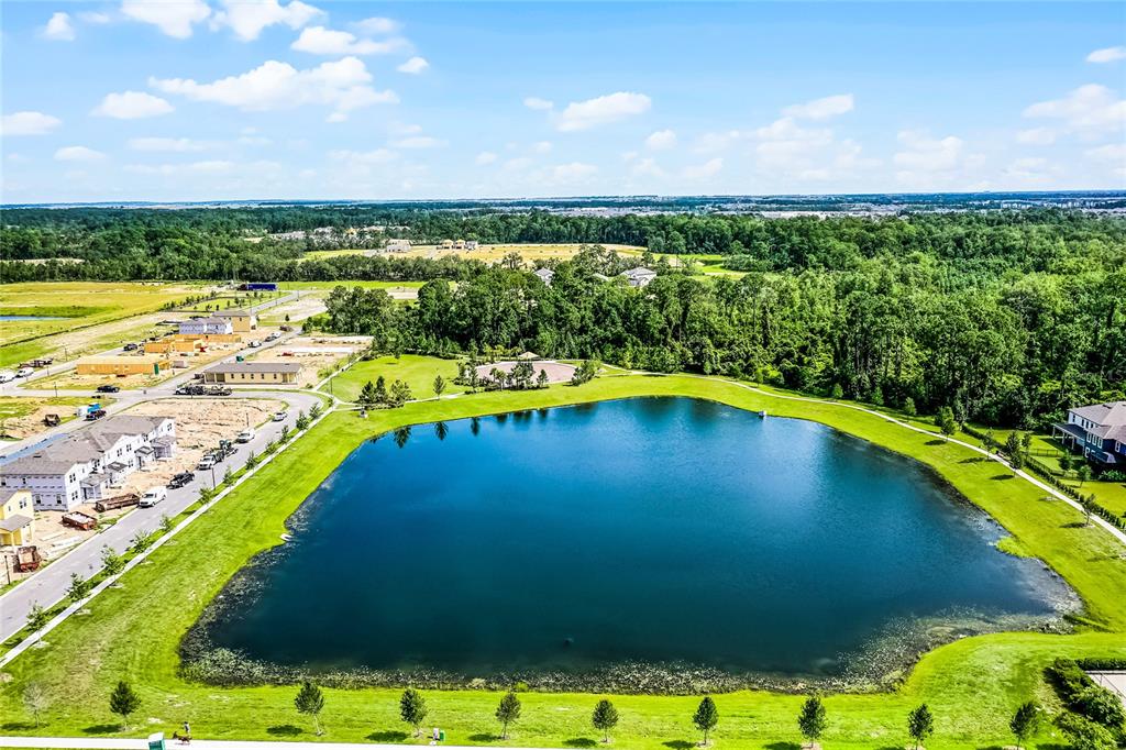 17588 Lake Star Road Winter Garden, FL 34787 - Photo 56 of 57 a view of a swimming pool with an ocean view