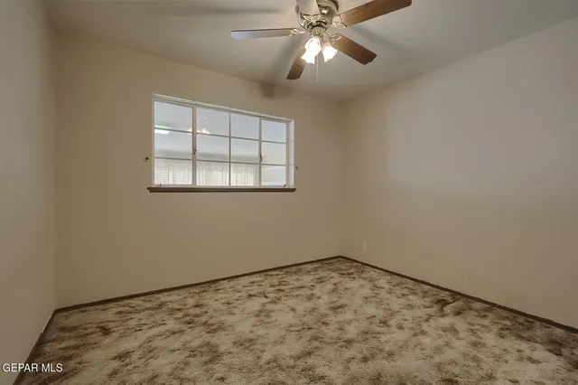 a view of a big room with closet and wooden floor