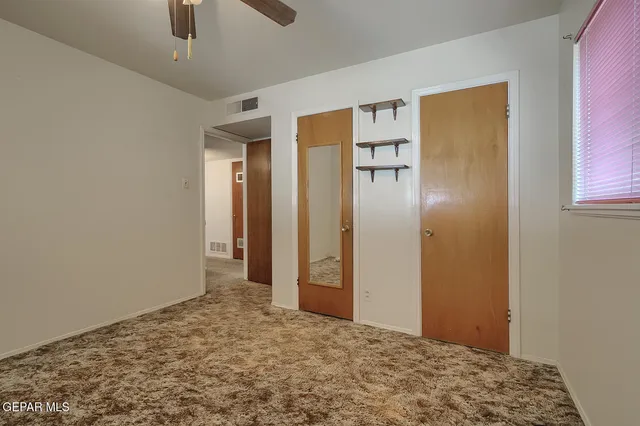 an empty room with window