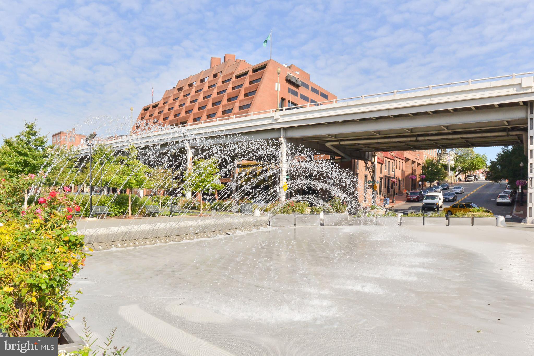 3220 Grace Street Northwest, Unit 5 Washington, DC 20007 - Photo 17 of 19 a view of a patio with table and chairs and potted plants