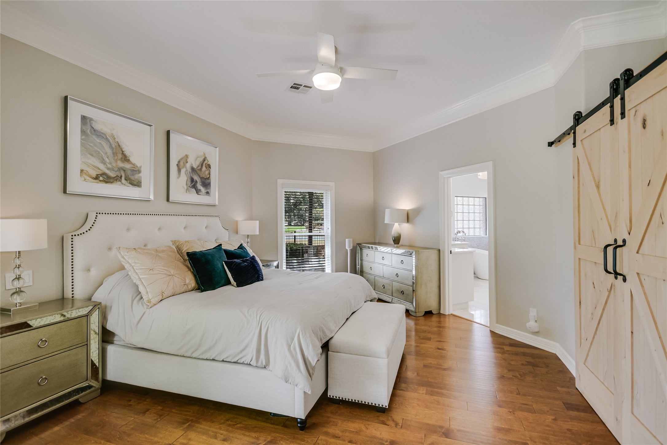 100 Dovetail Lane Georgetown, TX 78628 - Photo 11 of 34 a bed room with a bed and a chandelier