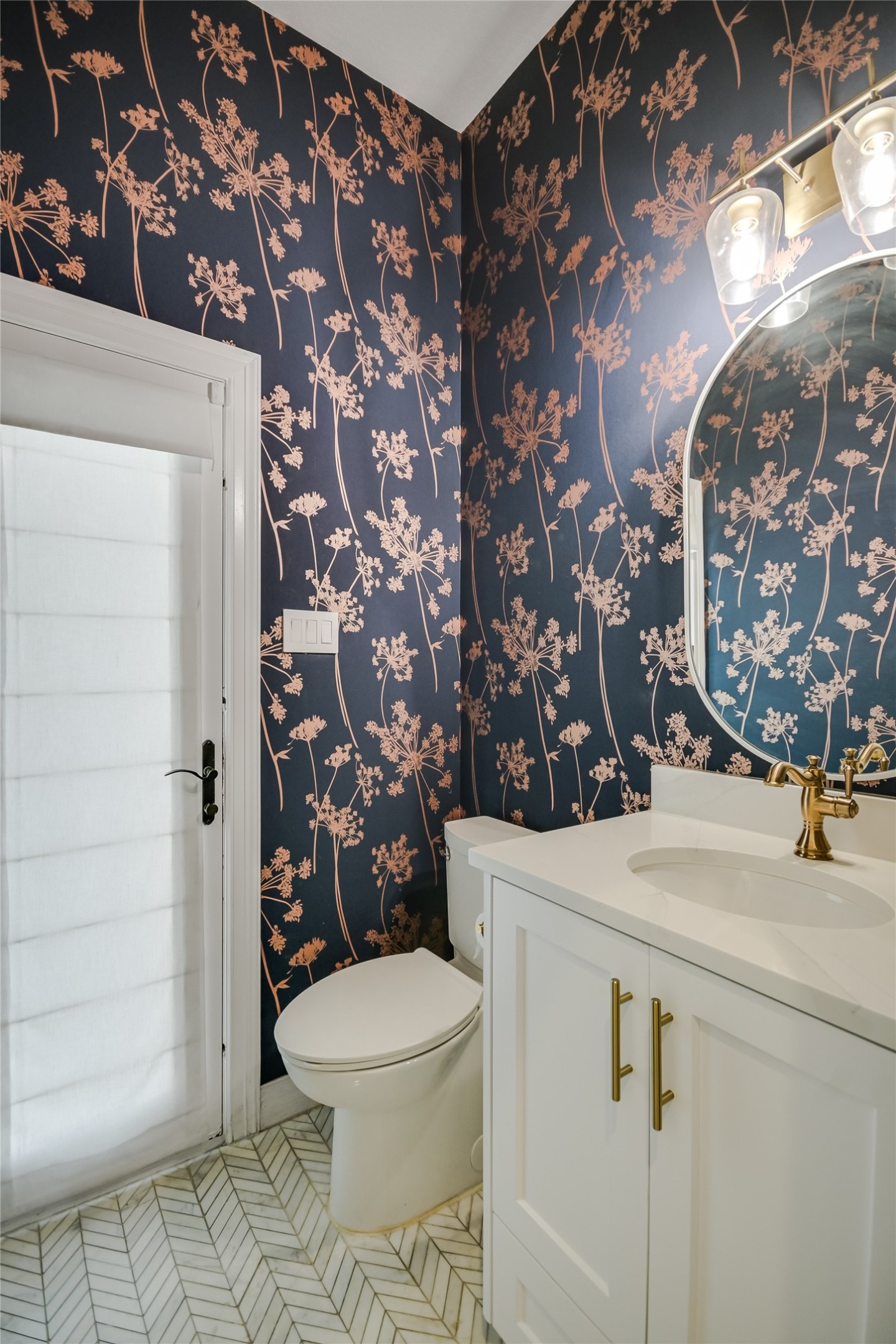 100 Dovetail Lane Georgetown, TX 78628 - Photo 15 of 34 a white toilet sitting next to a bathroom sink