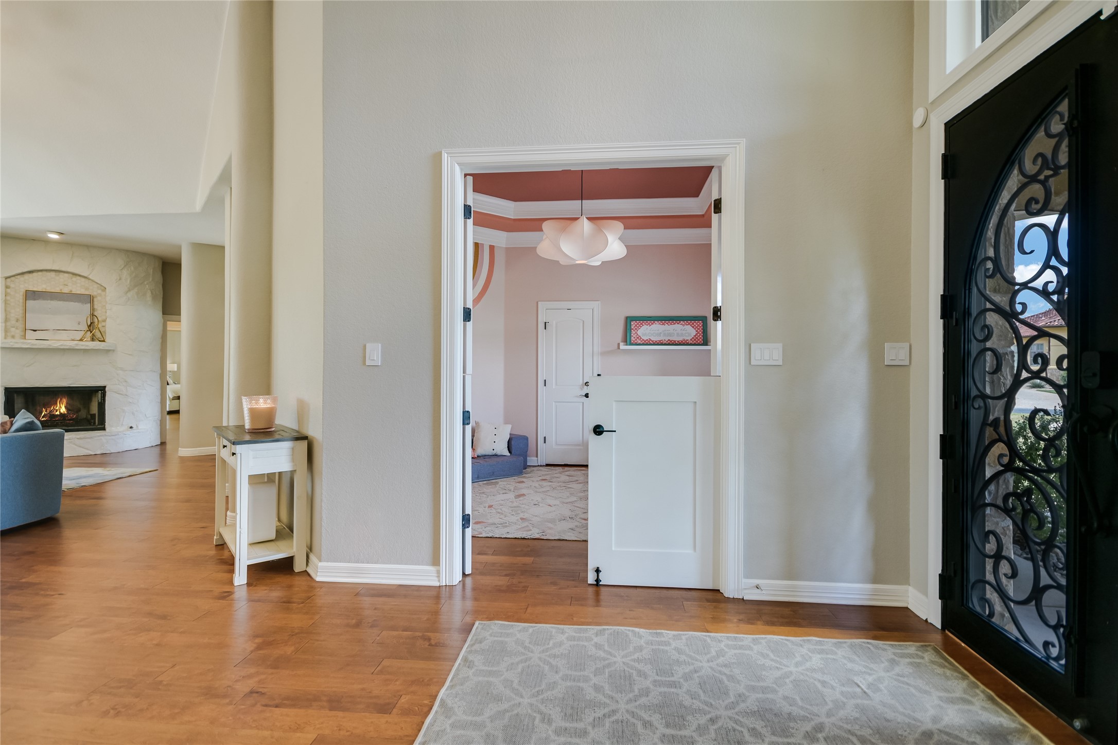 100 Dovetail Lane Georgetown, TX 78628 - Photo 17 of 34 an empty room with wooden floor and a fireplace