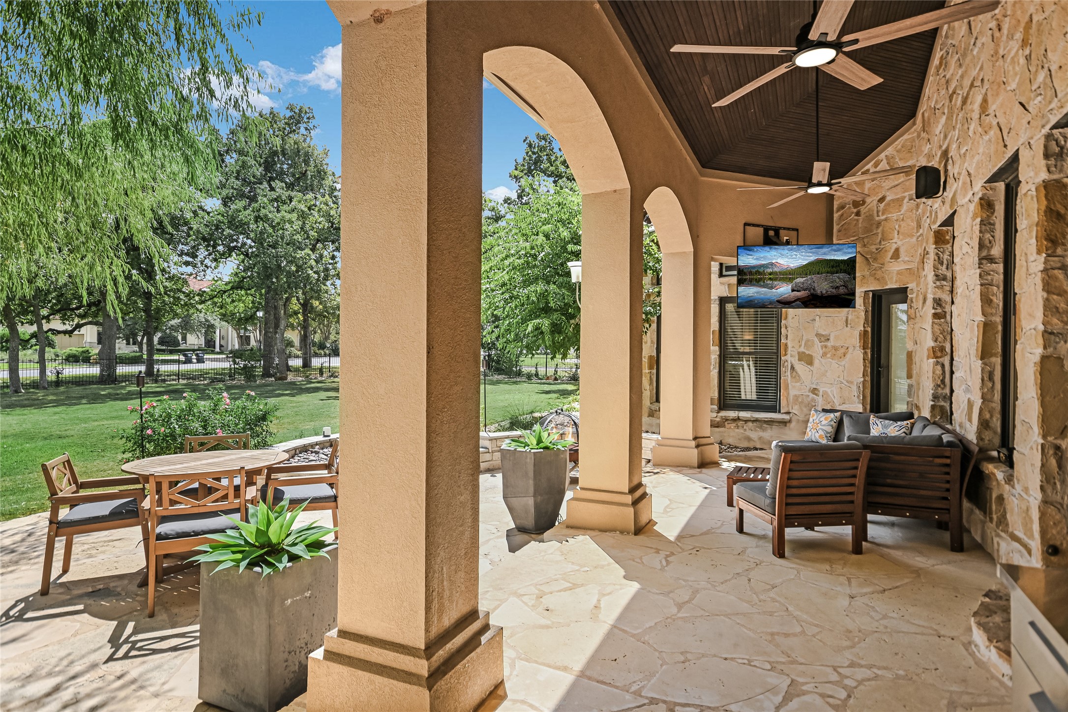 100 Dovetail Lane Georgetown, TX 78628 - Photo 29 of 34 a view of a patio with table and chairs potted plants with wooden floor and fence