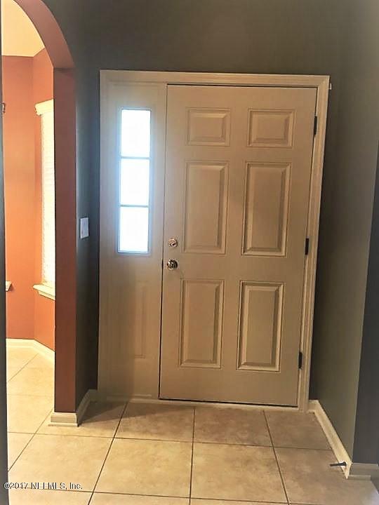 45157 Ingleham Circle Callahan, FL 32011 - Photo 13 of 27 a view of entryway with window