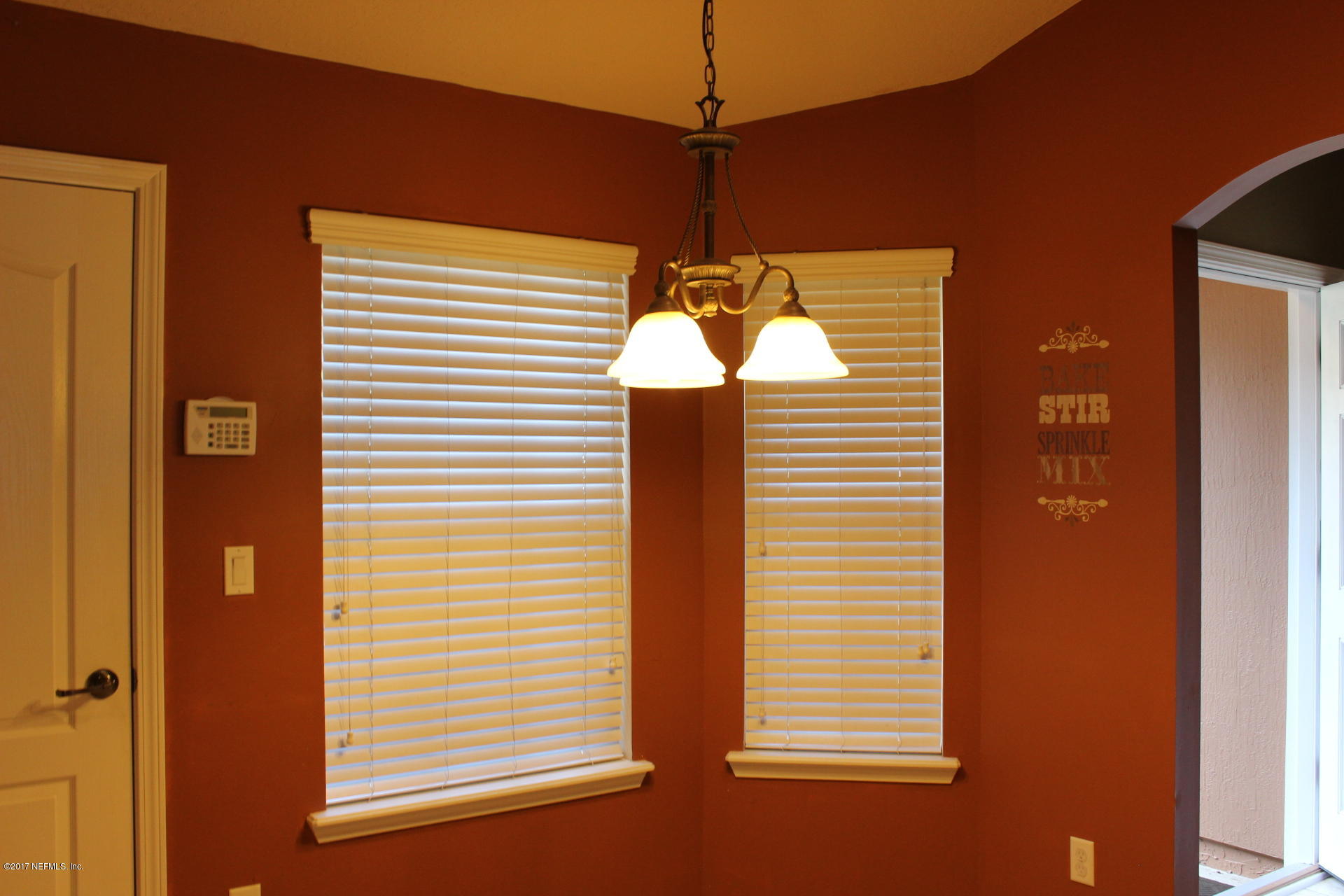 45157 Ingleham Circle Callahan, FL 32011 - Photo 16 of 27 a view of a room that has a windows and ceiling fan