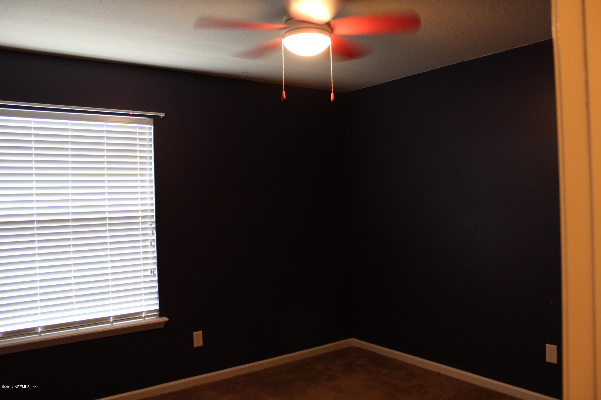 45157 Ingleham Circle Callahan, FL 32011 - Photo 22 of 27 a view of an empty room with a window