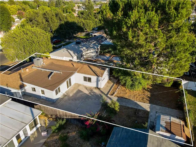 a view of a house with a street