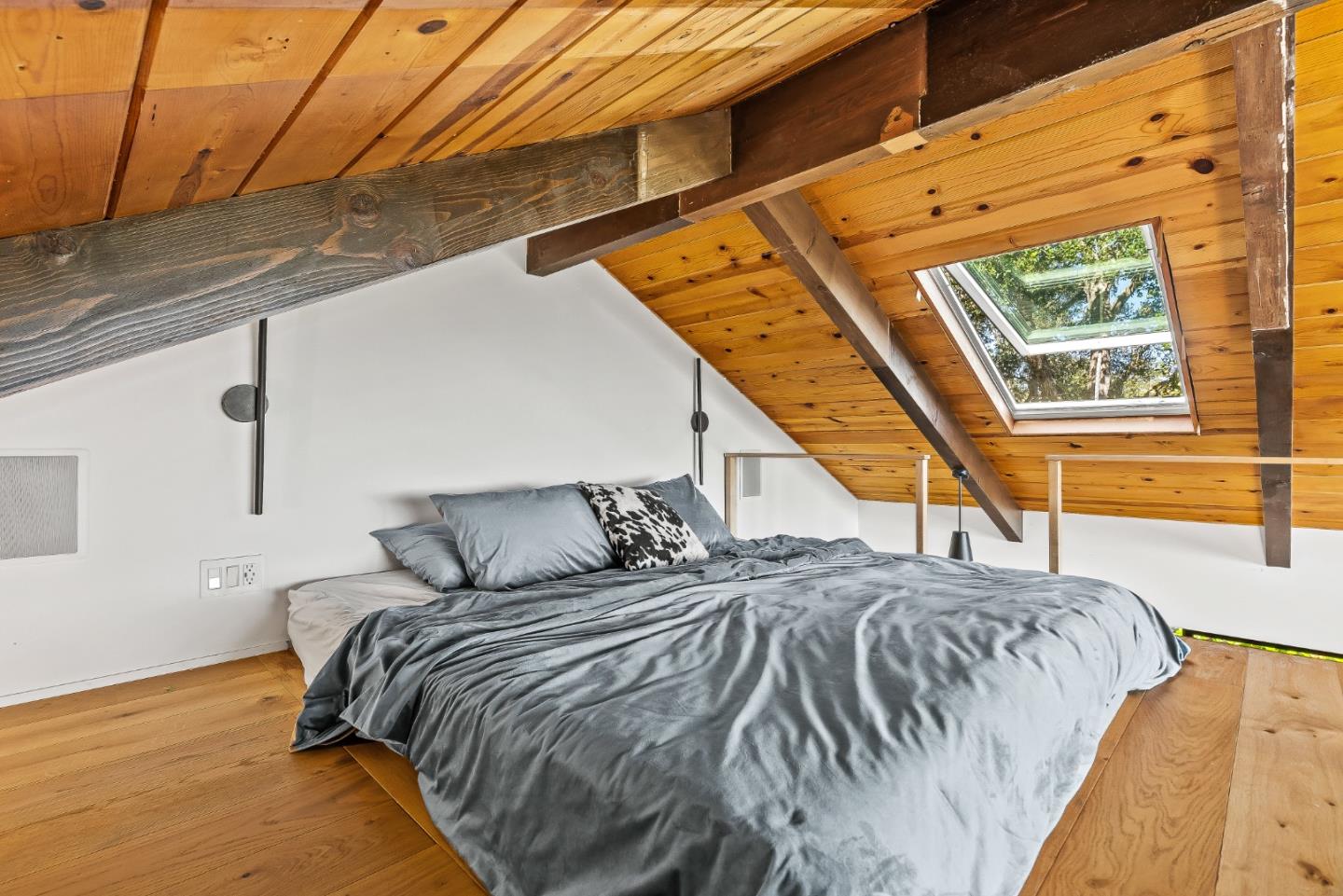 579 San Juan Pass Road Corralitos, CA 95076 - Photo 11 of 56 a bedroom with a bed and a large window