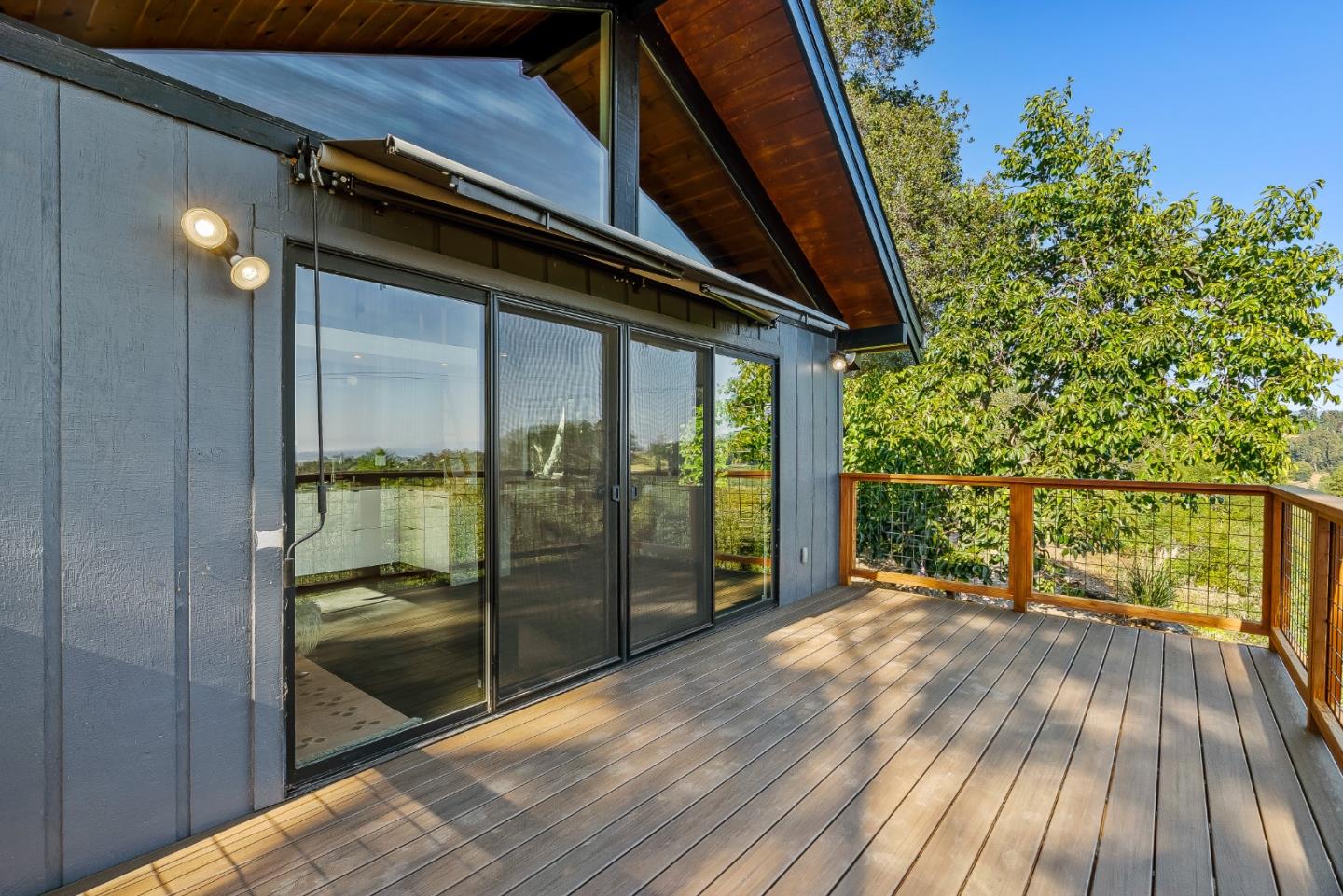 579 San Juan Pass Road Corralitos, CA 95076 - Photo 13 of 56 a view of outdoor space with wooden floor and windows