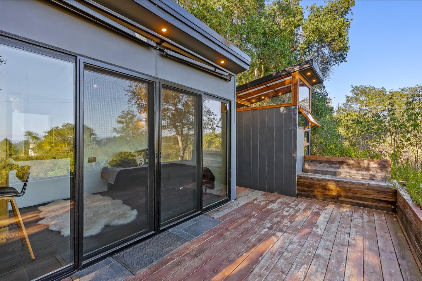 579 San Juan Pass Road Corralitos, CA 95076 - Photo 18 of 56 a backyard of a house with wooden floor and outdoor space