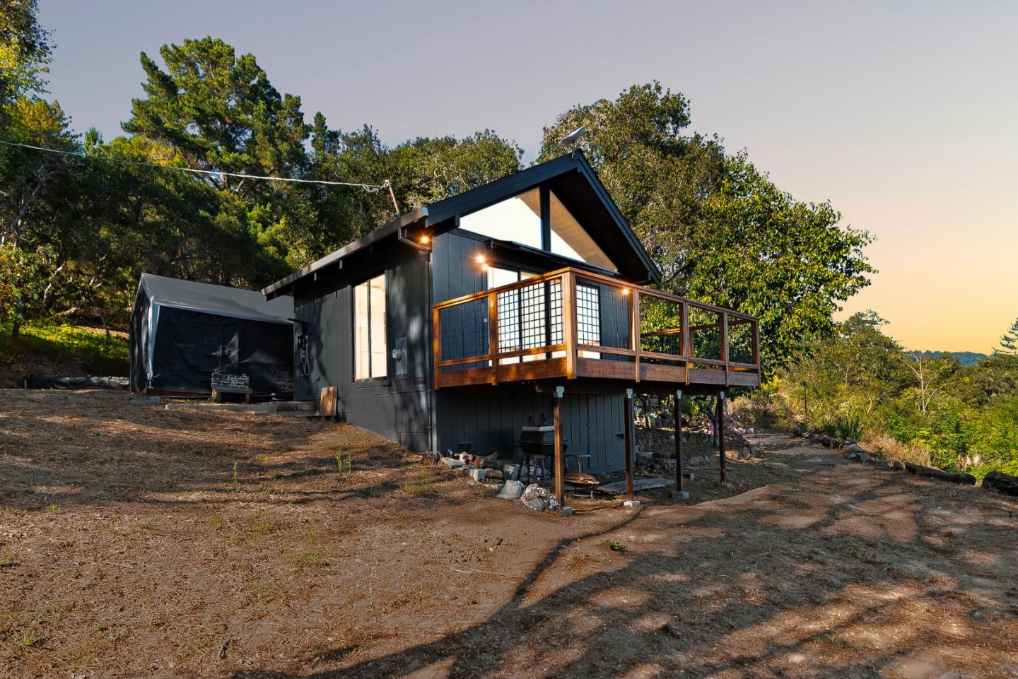 579 San Juan Pass Road Corralitos, CA 95076 - Photo 35 of 56 a view of a house with a patio and a yard