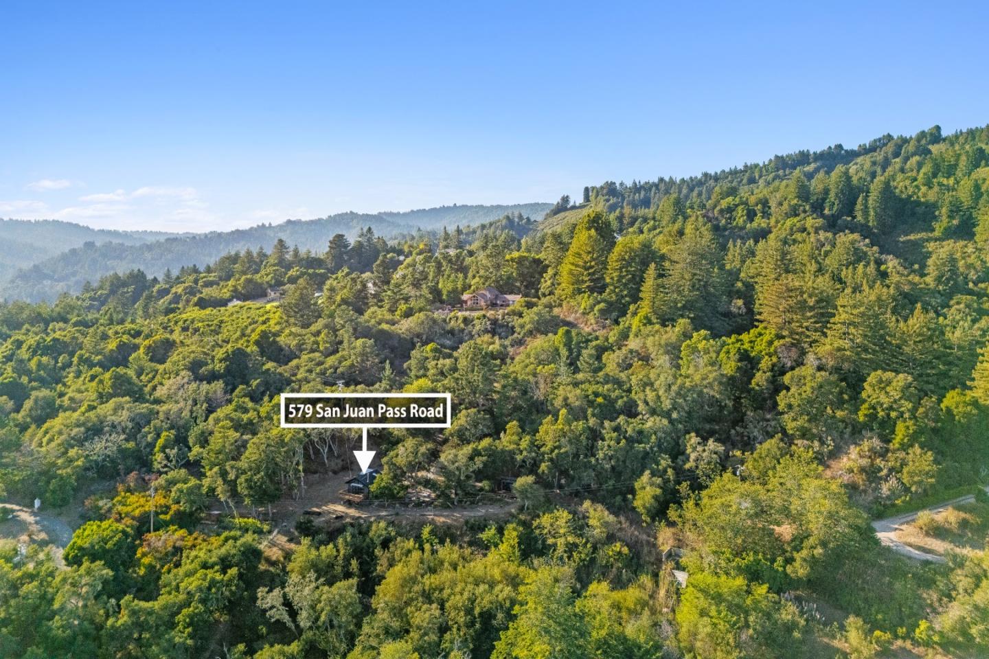 579 San Juan Pass Road Corralitos, CA 95076 - Photo 49 of 56 a view of a city with lush green forest
