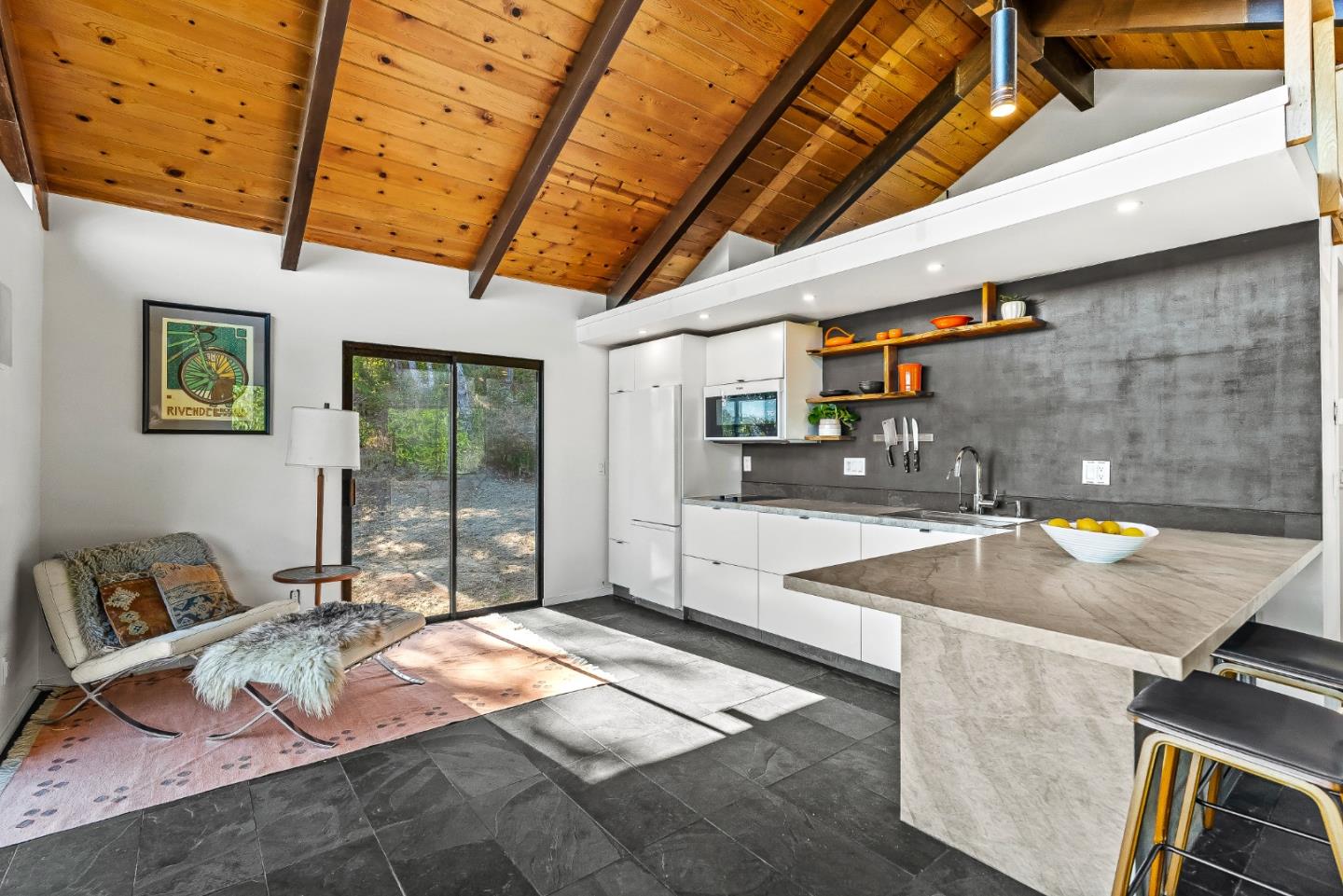 579 San Juan Pass Road Corralitos, CA 95076 - Photo 5 of 56 a kitchen with stainless steel appliances granite countertop a sink a stove and a wooden cabinets