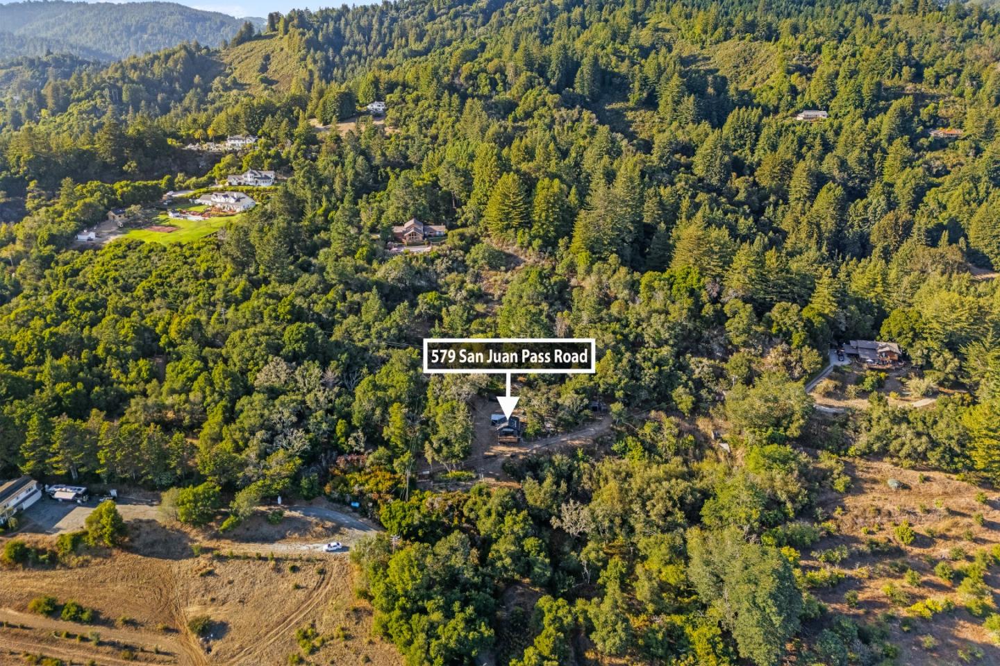 579 San Juan Pass Road Corralitos, CA 95076 - Photo 51 of 56 a sign broad in front of it