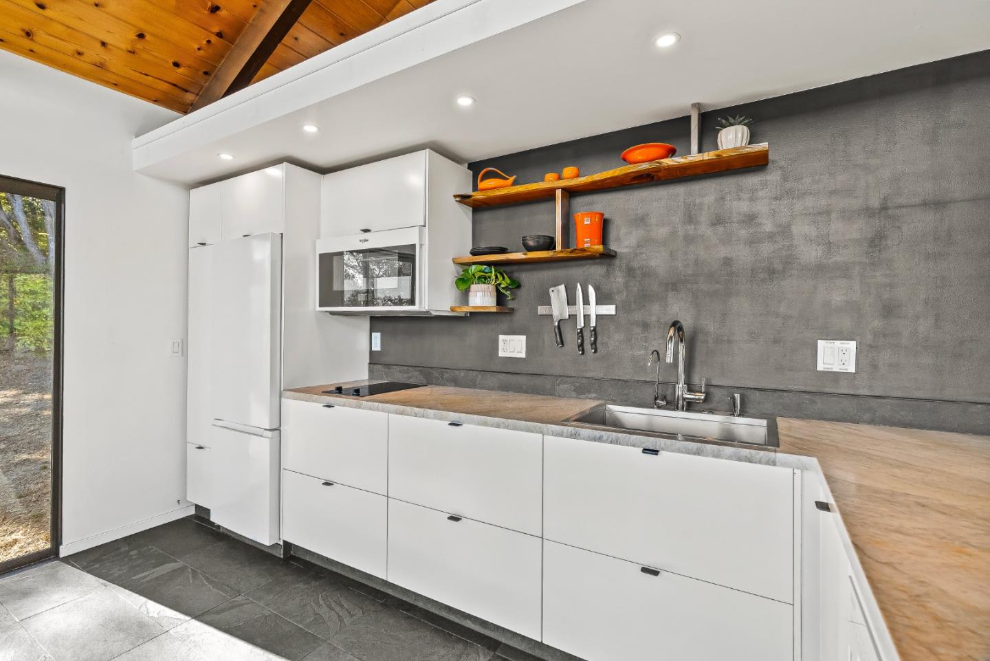 579 San Juan Pass Road Corralitos, CA 95076 - Photo 9 of 56 a kitchen with stainless steel appliances granite countertop a sink and cabinets