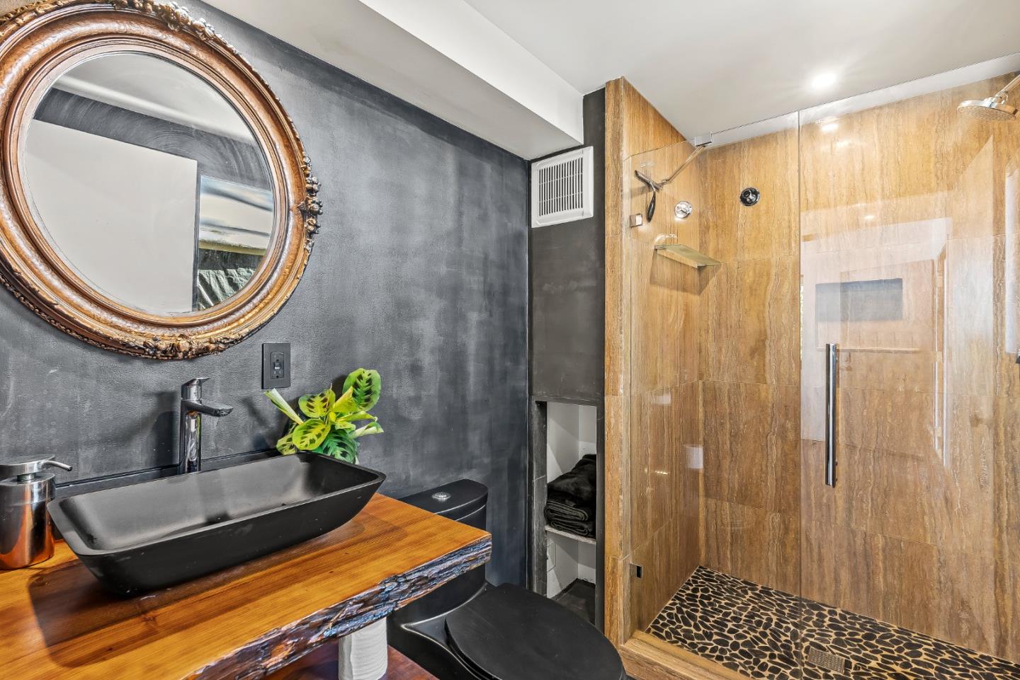 579 San Juan Pass Road Corralitos, CA 95076 - Photo 10 of 56 a bathroom with a sink a toilet and a shower