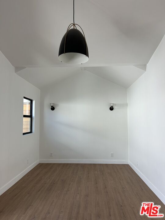 17209 Keswick Street Lake Balboa, CA 91406 - Photo 7 of 19 wooden floor in an empty room