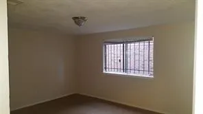 a view of a small space with a window